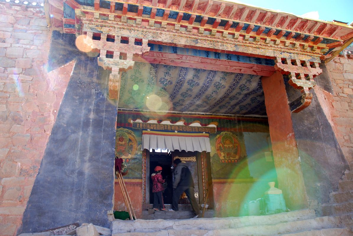 64 Zutulpuk Gompa Entrance In Eastern Valley On Mount Kailash Outer Kora The entrance door to Zutulpuk Gompa, with the Guardian of The West on the left, and the Guardian of the North to the right.